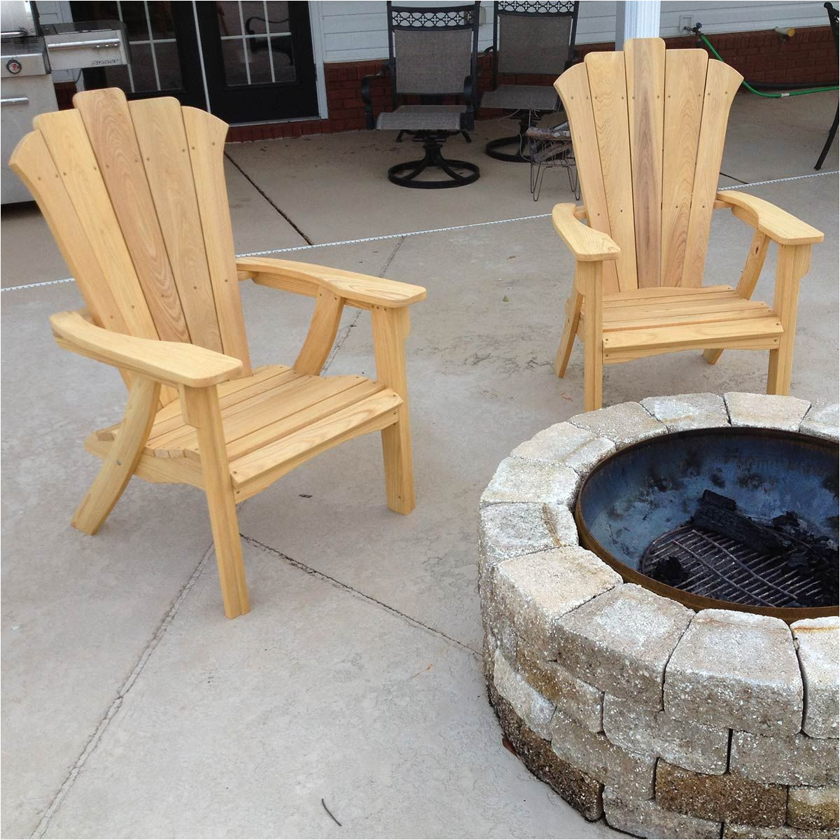 this adirondack chair and matching love seat are designed for outdoor comfort they re designed for easy assembly so that a novice can build them and you