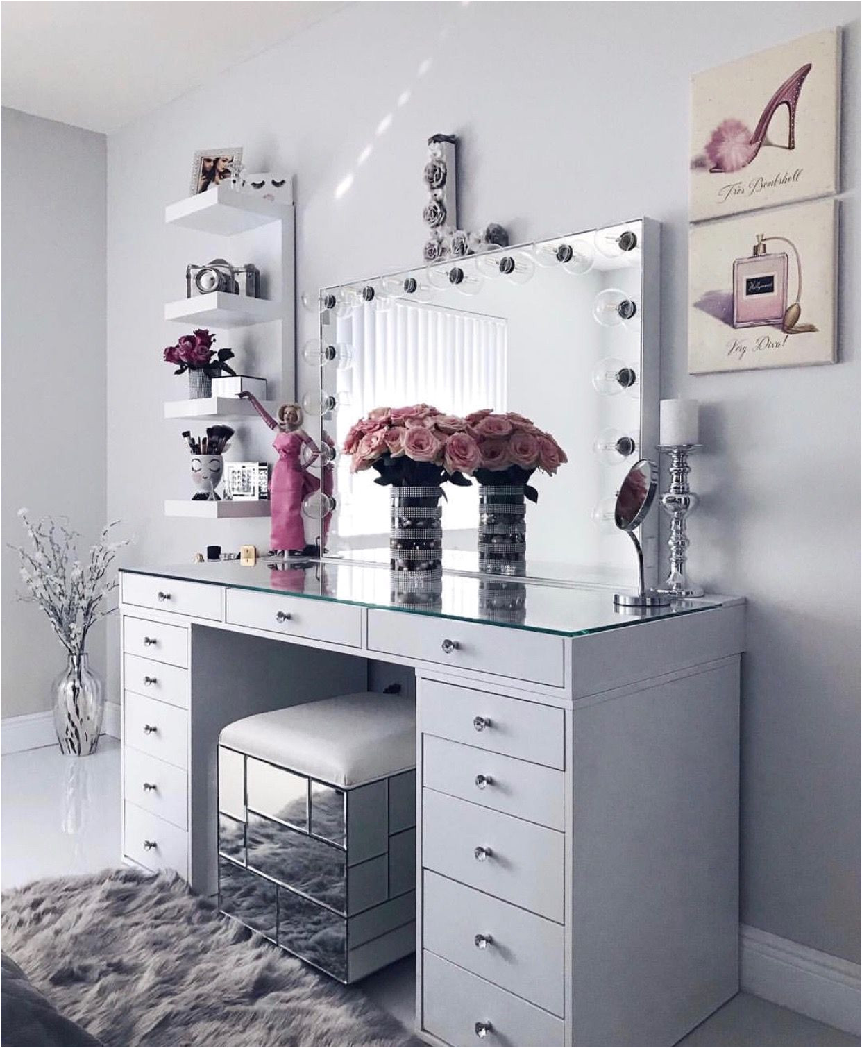 white clean sleek vanity decor paintings flowers glass furniture perfect idea for smaller apartments