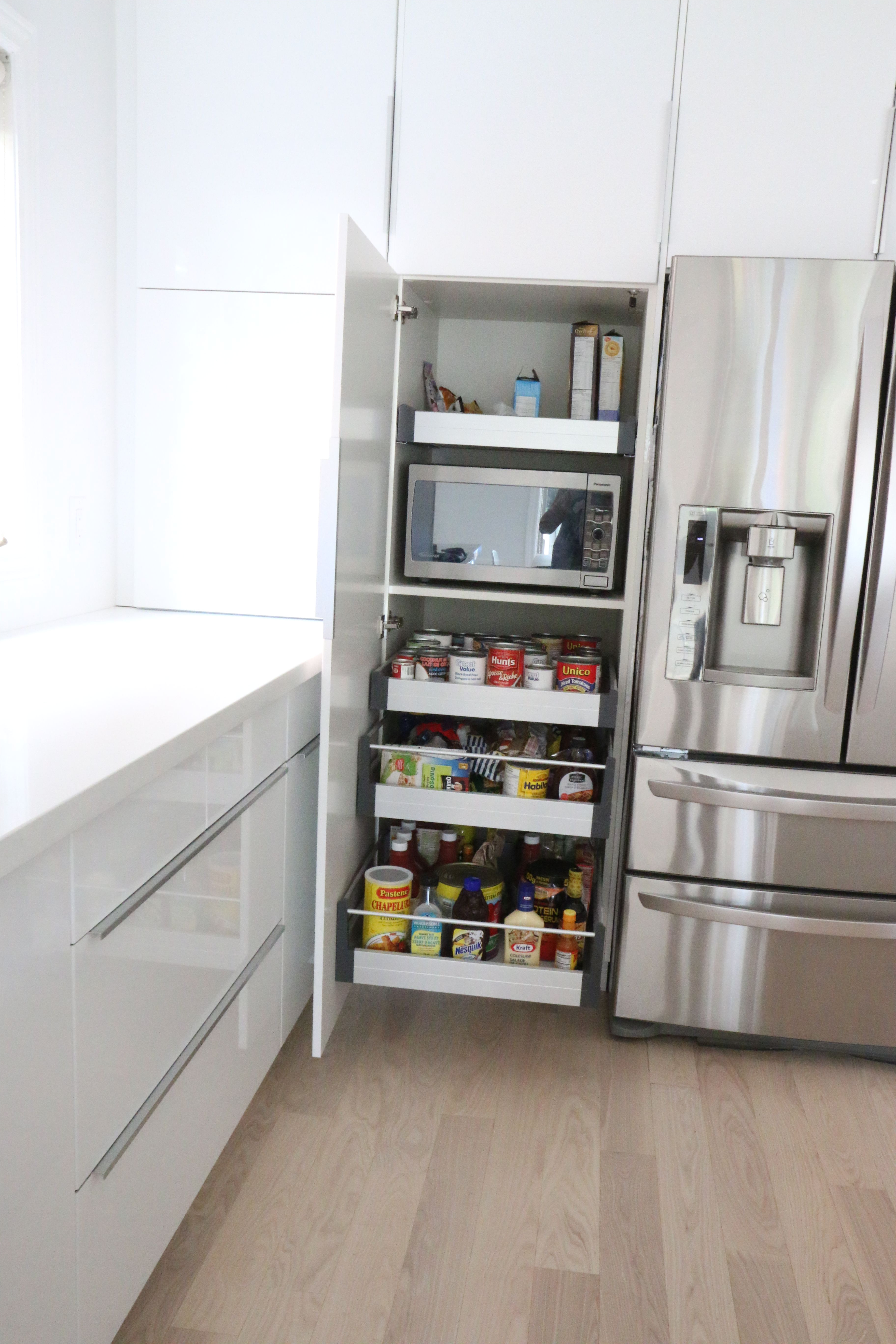 Under Cabinet Wine Glass Holder Ikea Perfect Way to Hide the Microwave and Still Make It Very Accessible