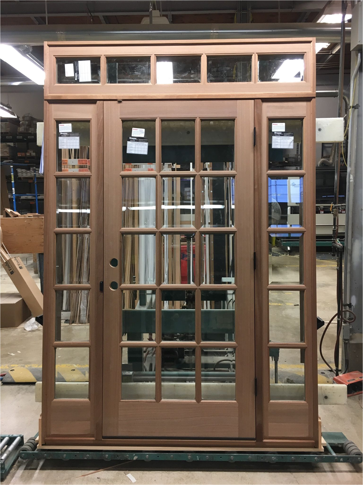 the brosco portland shop worked hard to set up this beautiful simpsondoorco door with 2 sidelites and a transom great job portland