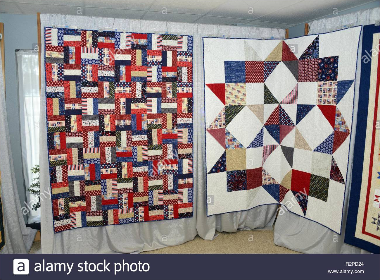 a pair of patriotic quits on display at a quilt show in fort dodge iowa