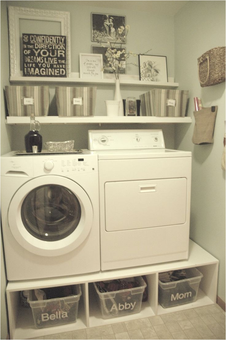 small laundry room mud room makeover with pedestals and shelves tremendously thrifty would use different baskets underneath and would center washer dryer