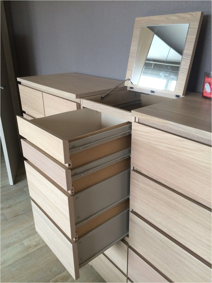 a laundry basket disguised in malm chest of drawers ikea hackers