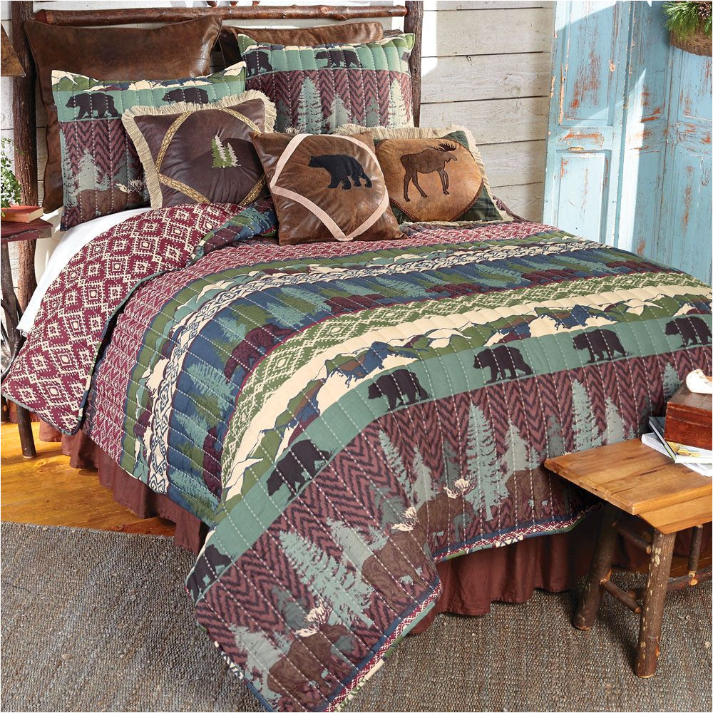 bear gulch quilt bedding collection moose bears evergreens and mountains combined with a lodge ikat print evoke the spirit of outdoor living on this