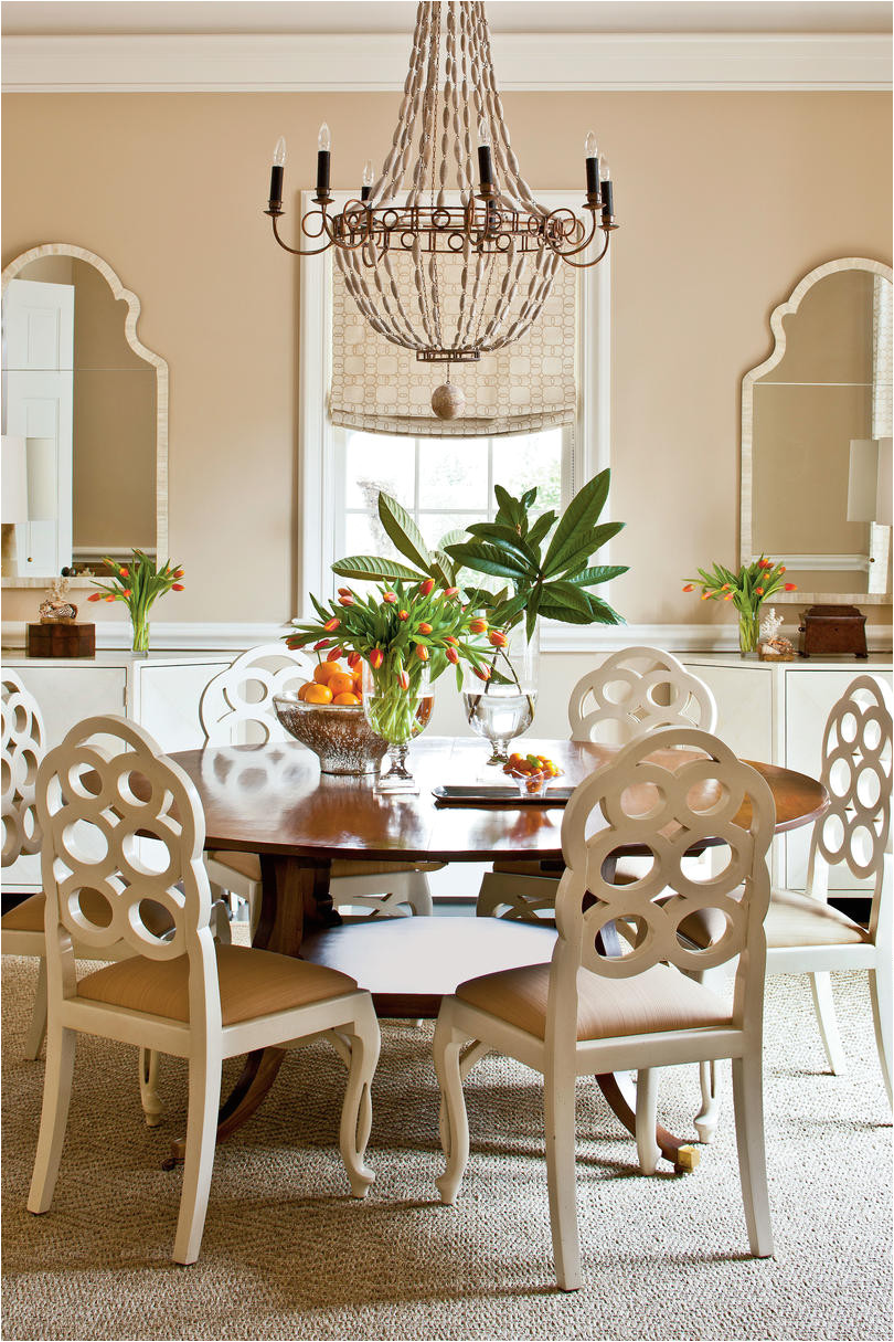 a large round table in a square dining room makes conversations easier and most have leaves