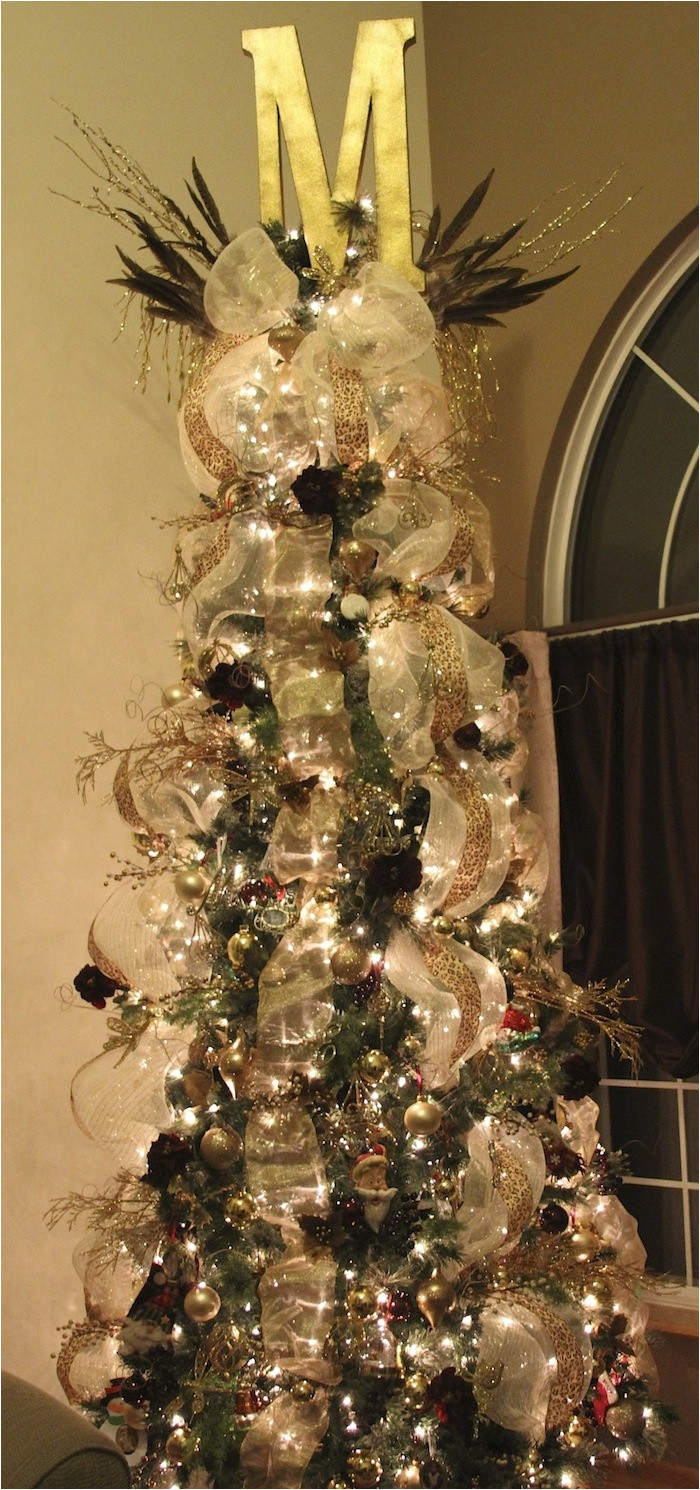 holiday home tour love the monogram at top of christmas tree
