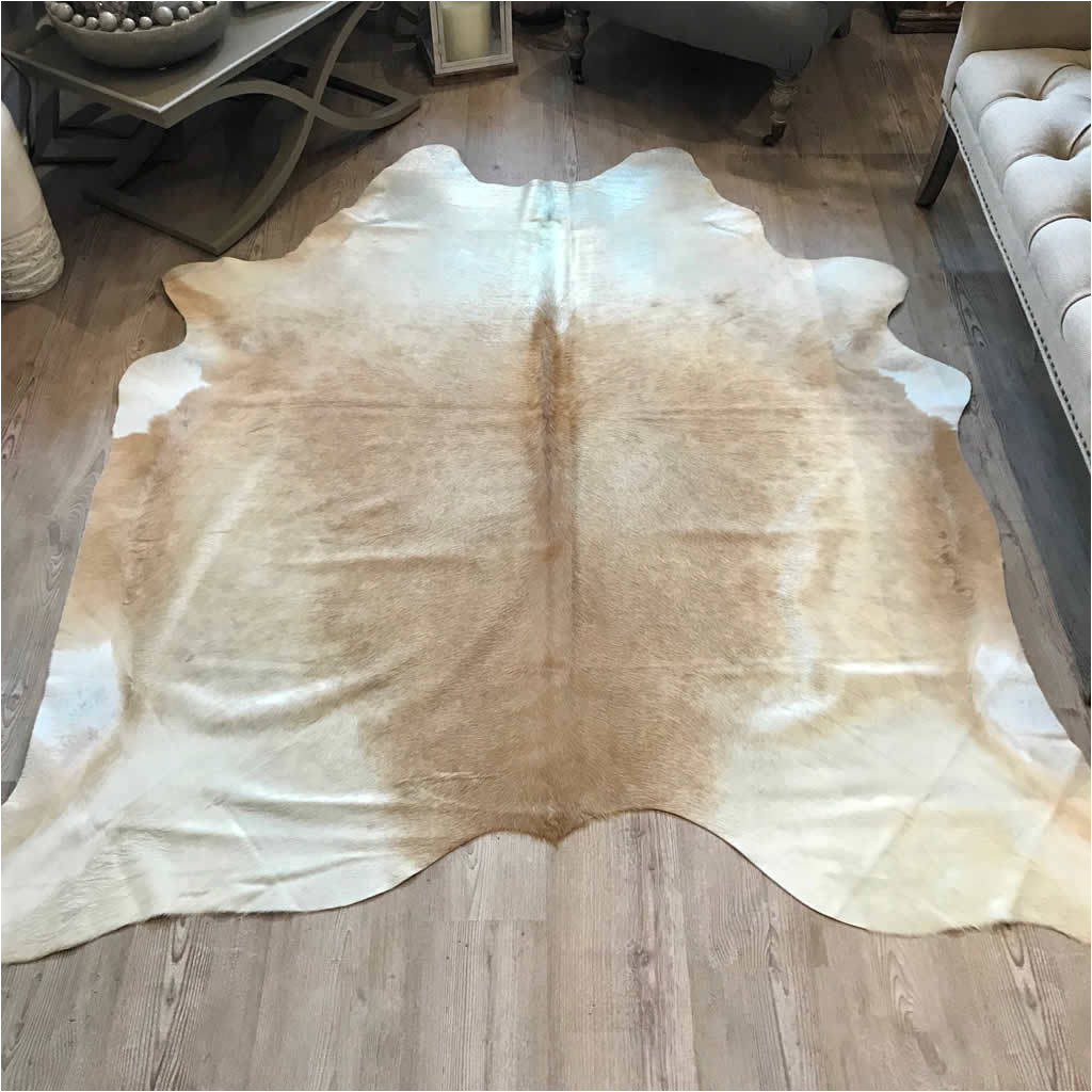 cowhide rug caramel gold and cream