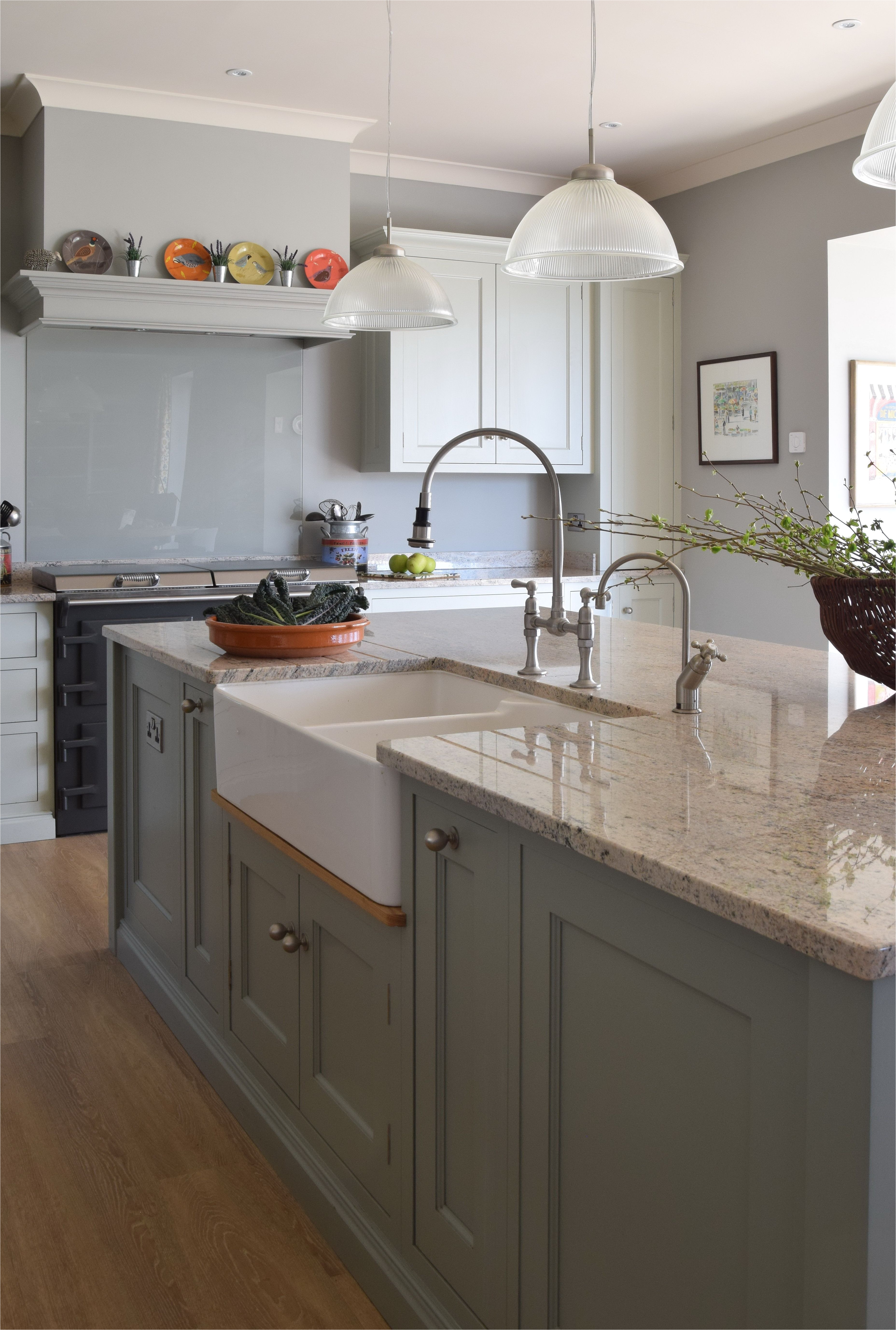 stunning handmade island cabinetry painted in farrow and ball pigeon walls in farrow and ball cromarty granite work surface is ivory fantasy