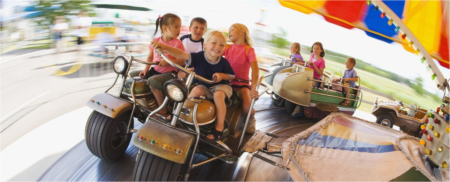 kids on a ride at myrtle beach family kingdom