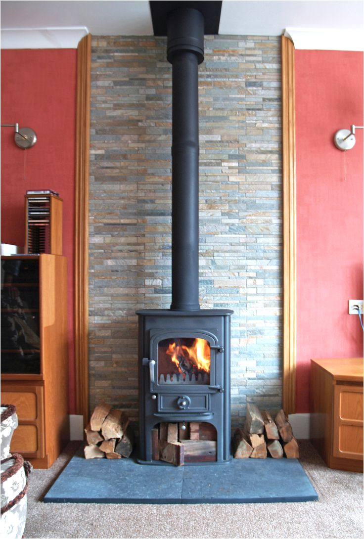 scarlett s bespoke fireplace portfolio images show our capabilities as unique fireplace designers and installers a wood burning stove should always