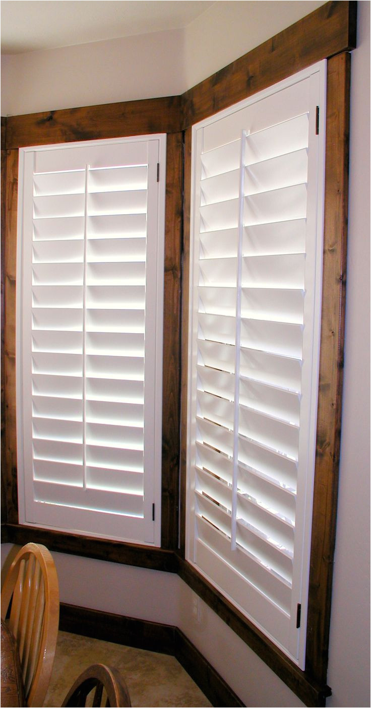 dark trim white plantation shutters