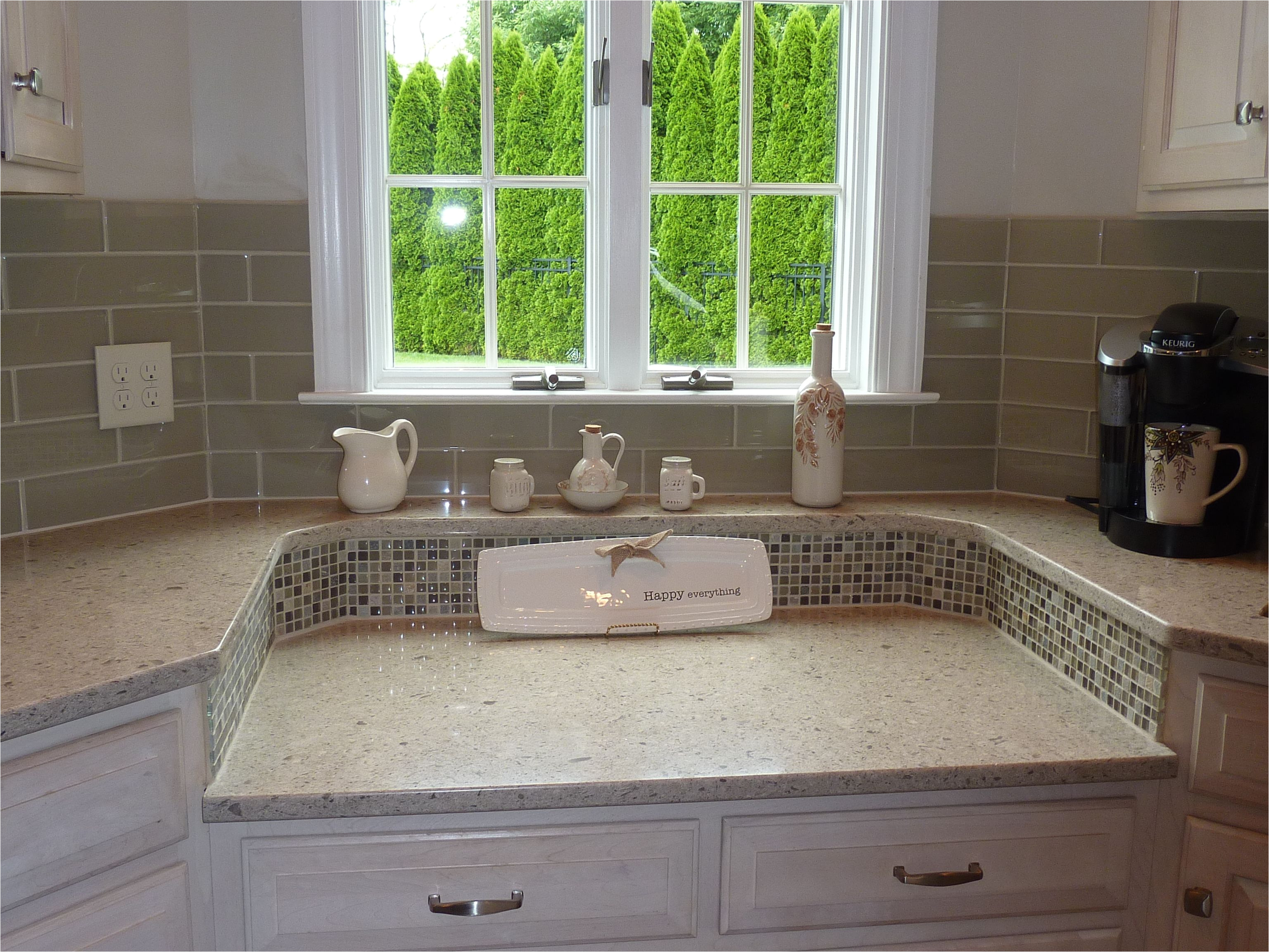 cambria darlington quartz counters bliss stone glass mosaics and bliss element earth glass subway tiles