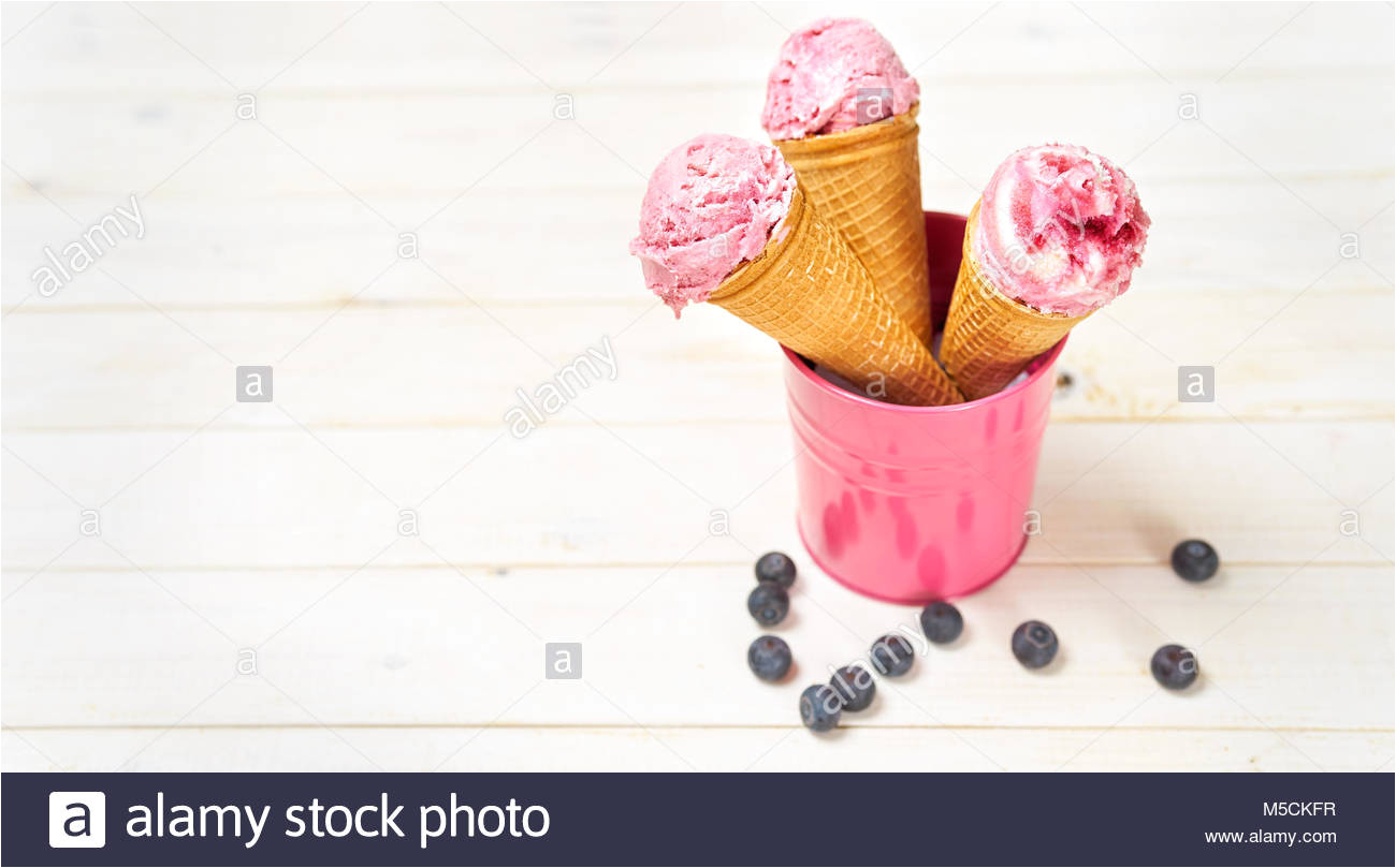 blueberry ice cream cones in mini bucket stock image