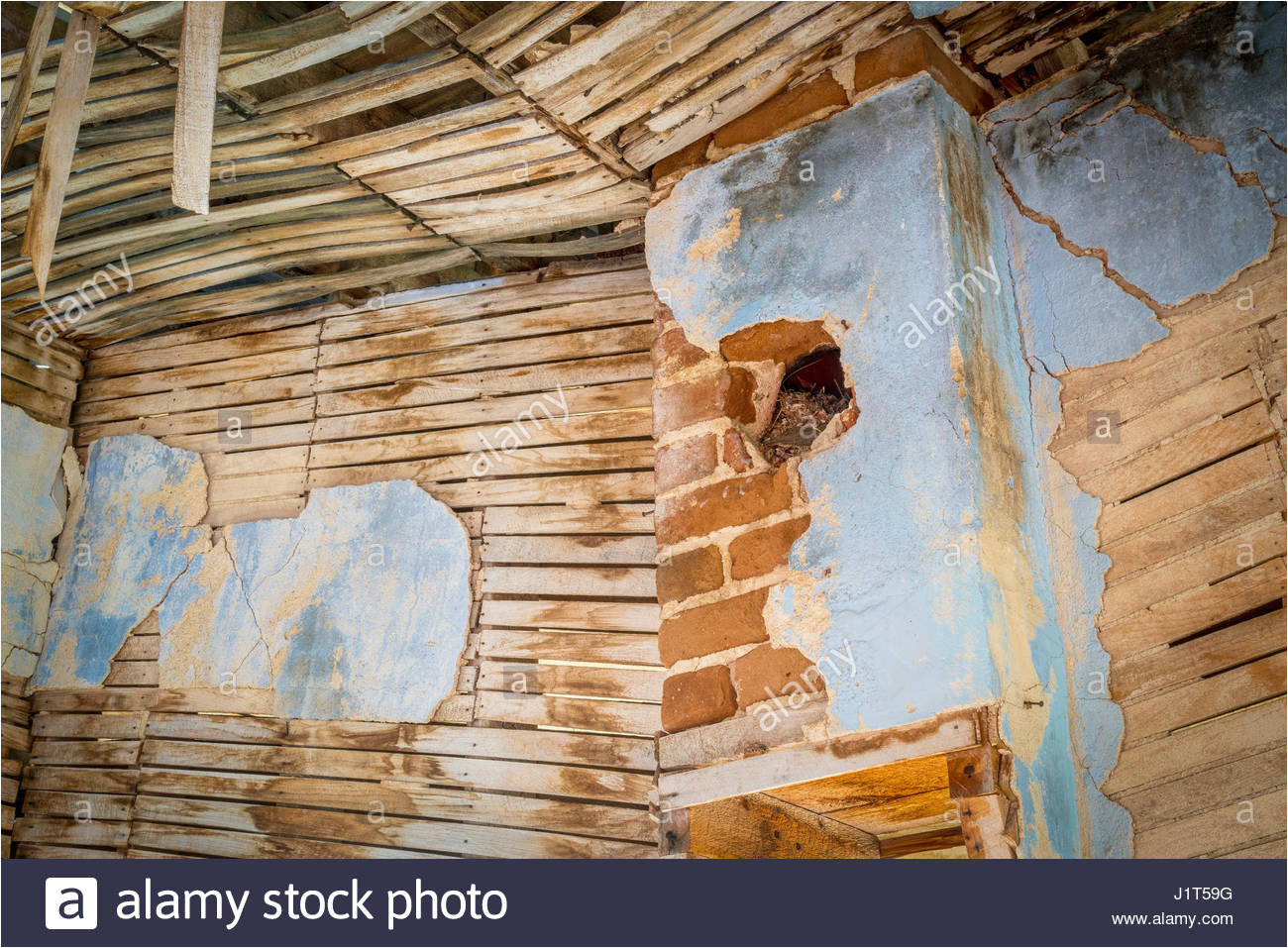 urban decay abstract damaged interior od an abandoned house at an old gold mine in