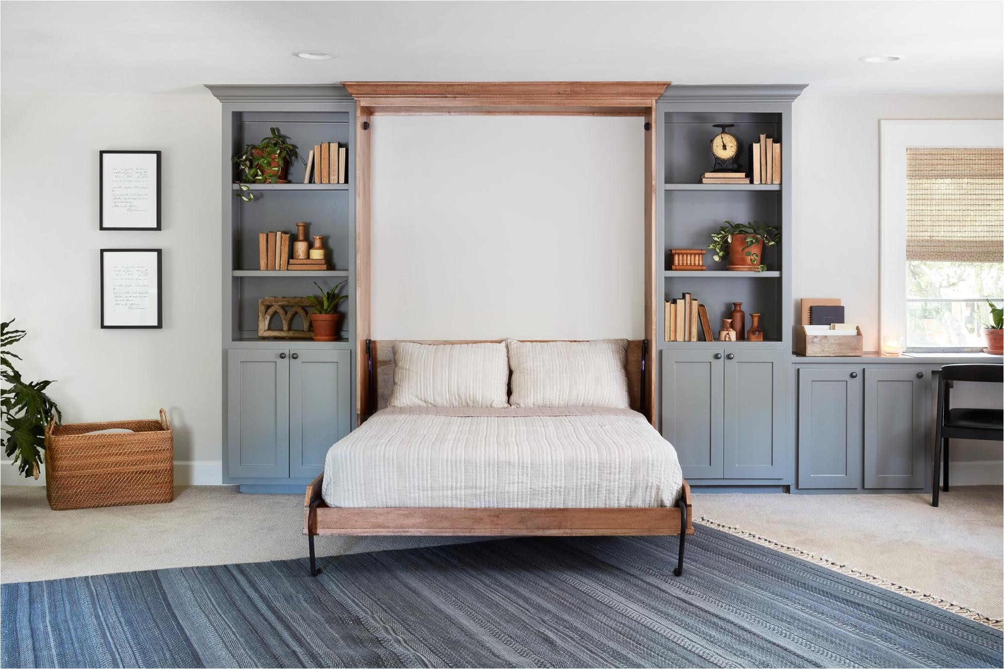 our solution for converting this space to a guest room was to incorporate a murphy bed since this room is in an upstairs loft style area of the home