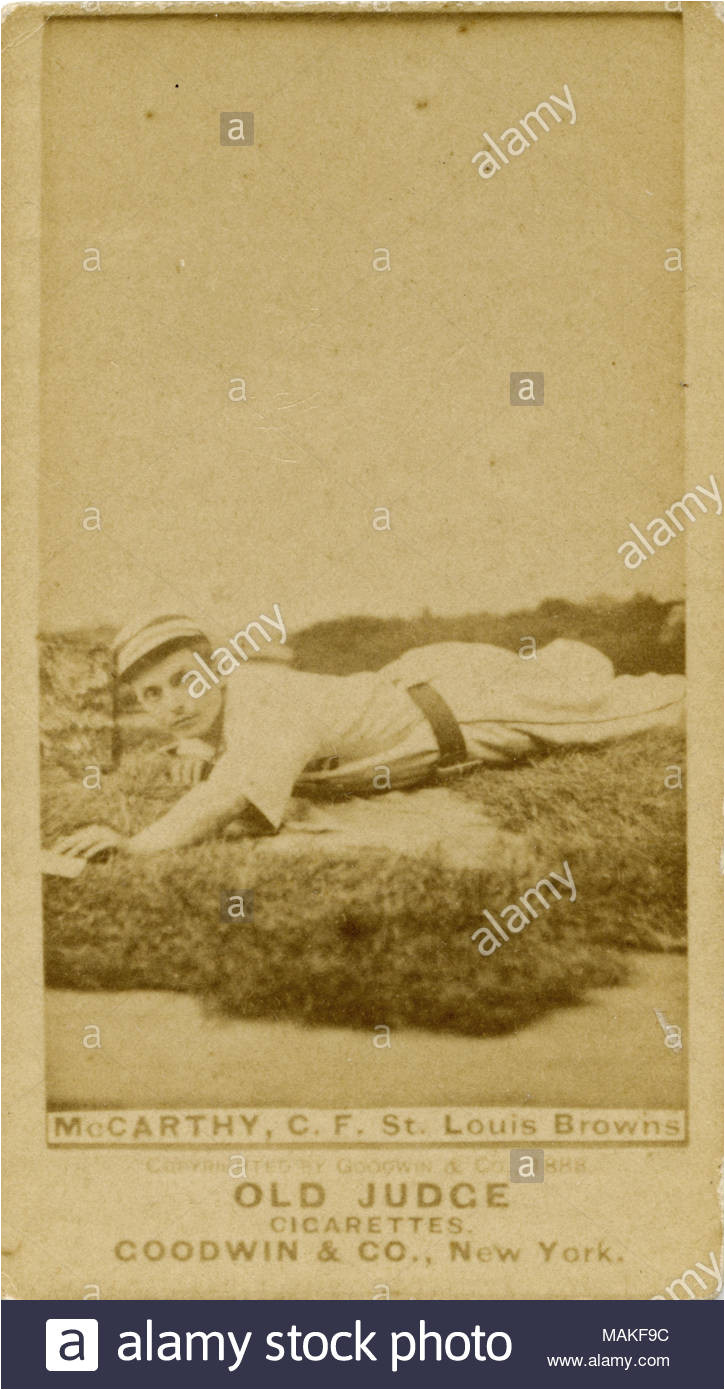 vertical sepia photograph on a baseball card of mccarthy he is wearing white with