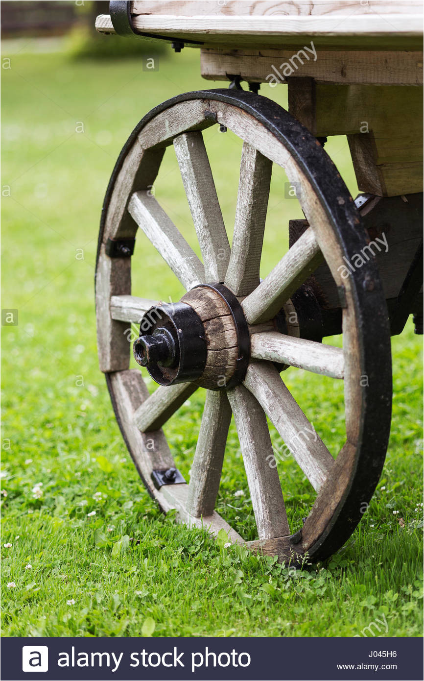 old wooden wheel of wagon close up outside stock image