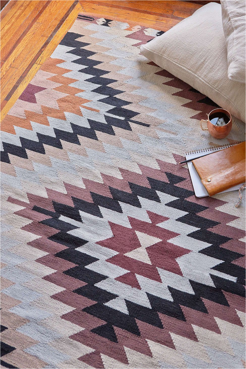 the pattern of this rug combined with these colors makes it the ideal accent piece in any room