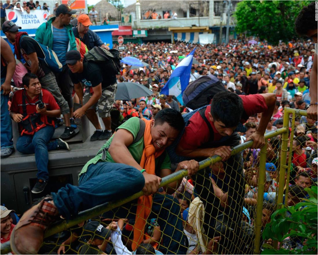 thousands of honduran migrants rush across the border toward mexico in tecun uman guatemala