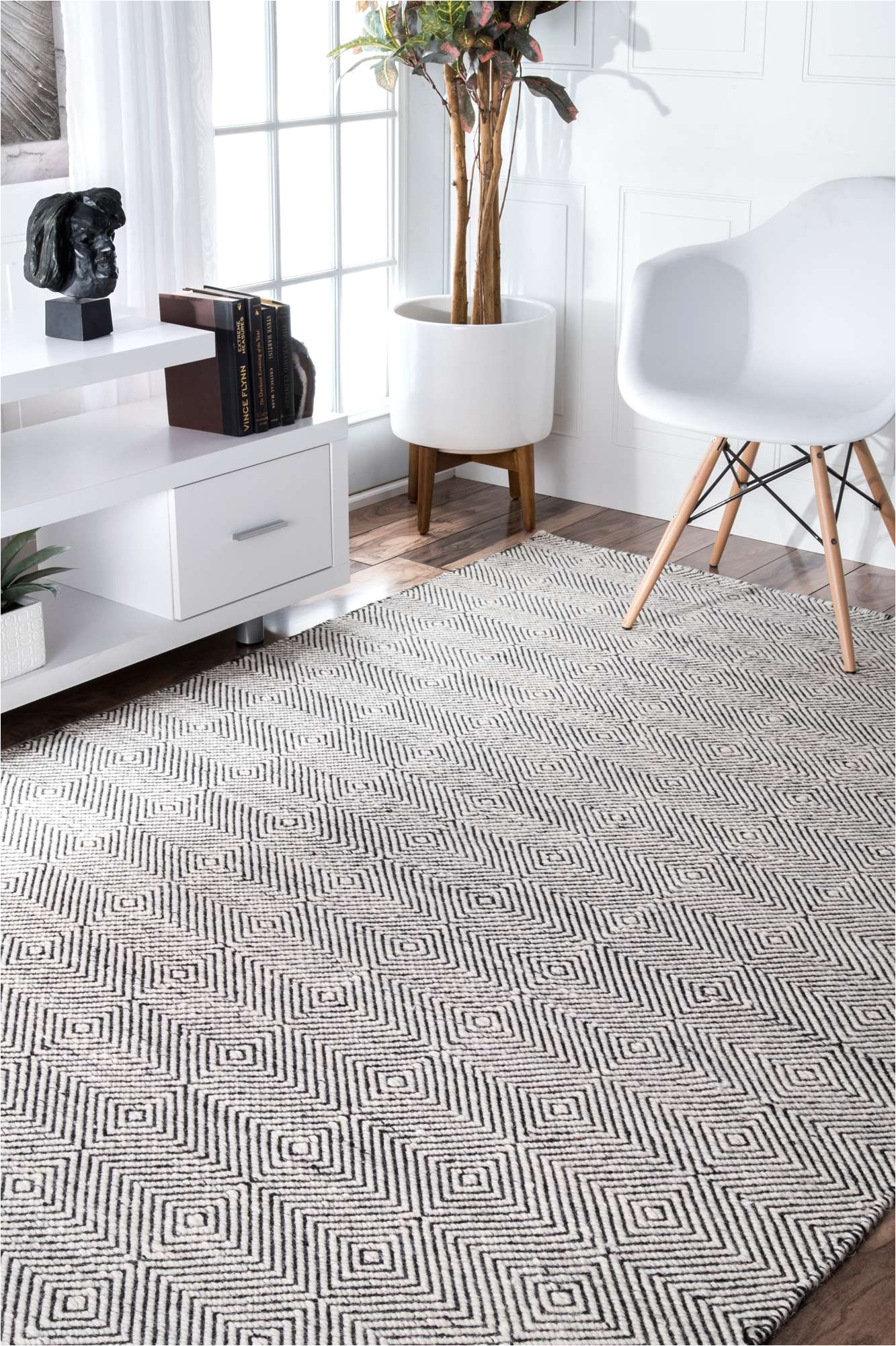 create an urban and chic look with this contemporary hand woven paddle rug that spells quality as well as durability available in subtle colors and