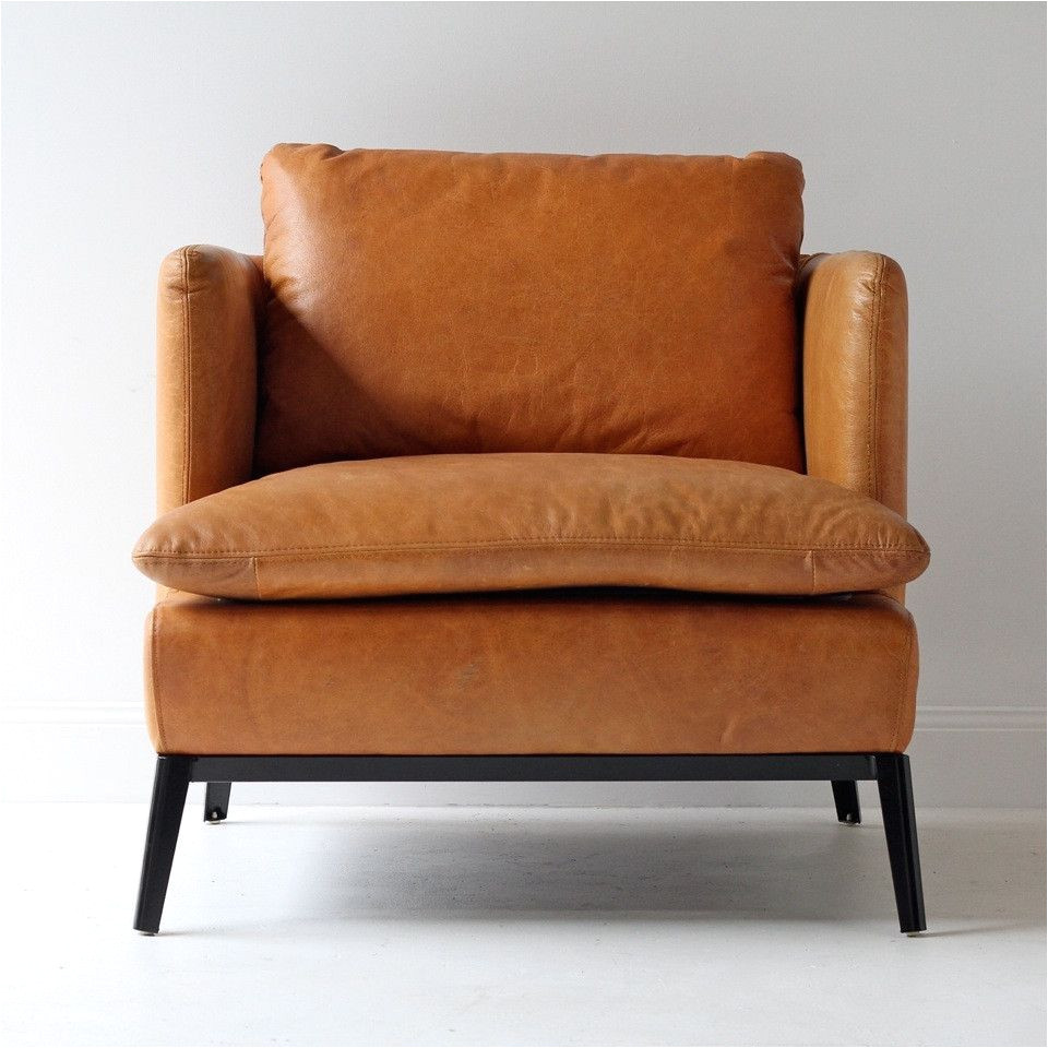 gorgeous leather armchair in a modern but classic look love this piece more