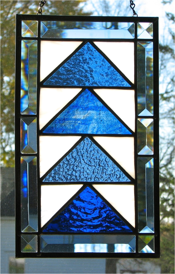 stained glass flying geese quilt block with blue and clear bevel border by barbara s glassworks