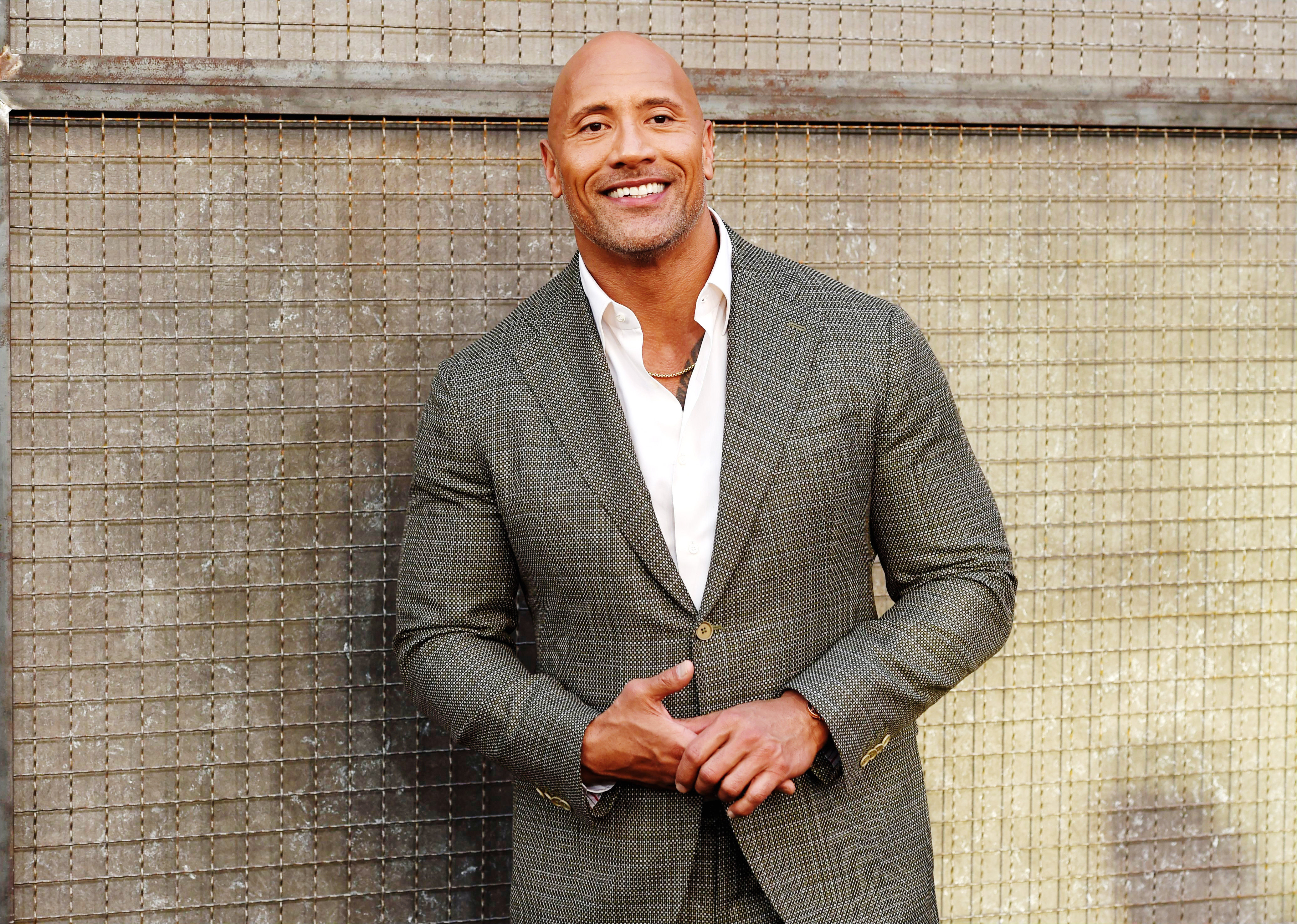 dwayne johnson arrives at the world premiere of rampage at the microsoft theater