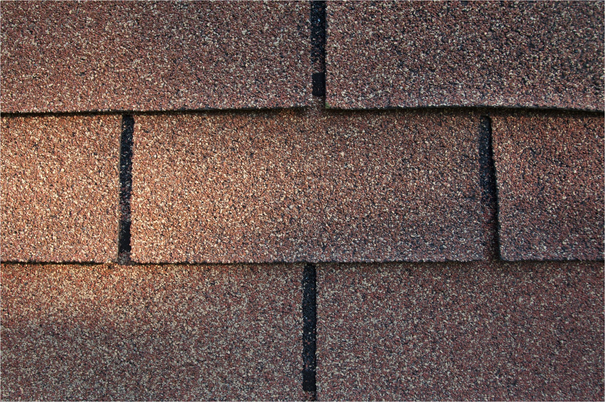 three tab asphalt shingle roofing in good condition