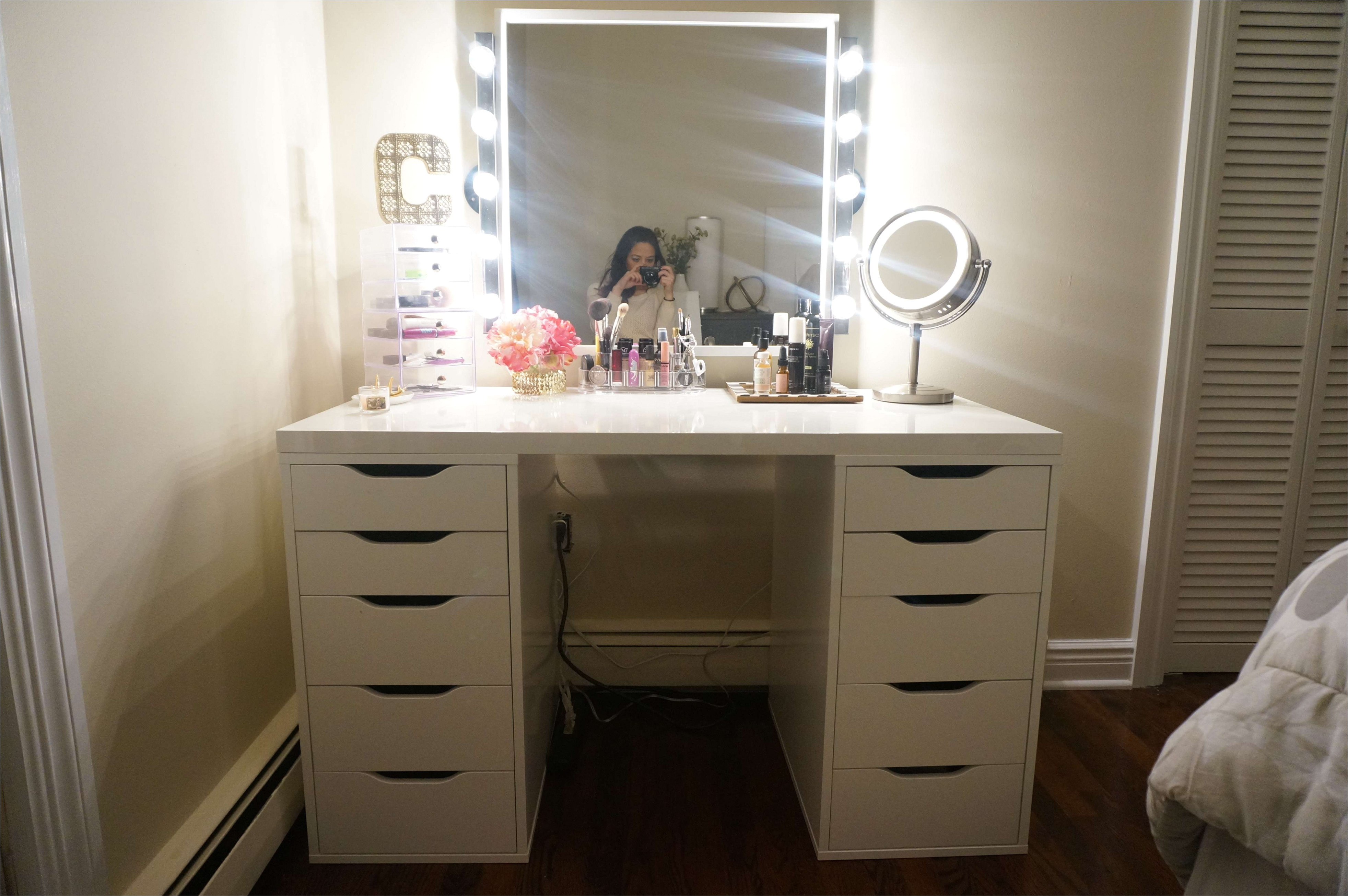 image of beautiful vanity table set with lighted mirror