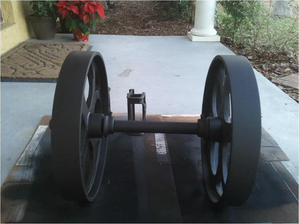 cast iron factory cart wheel painted black