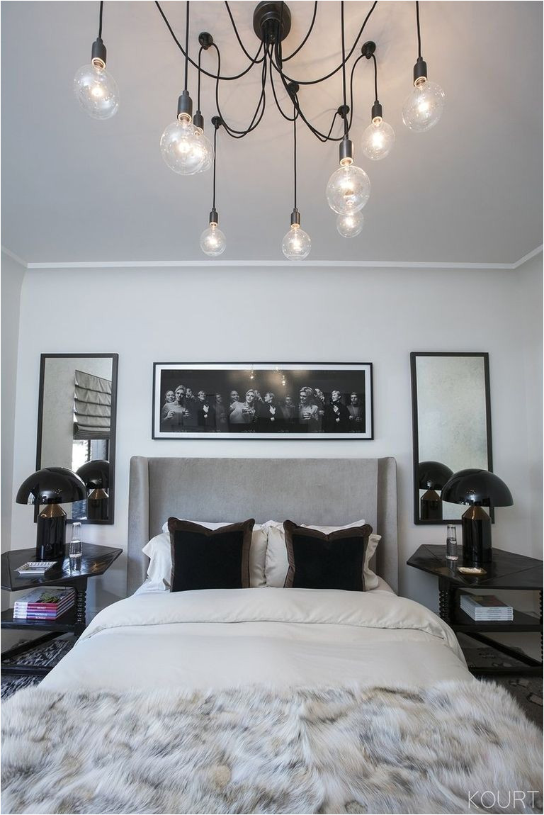 kourtney kardashian s guest bedroom grey headboard black decor