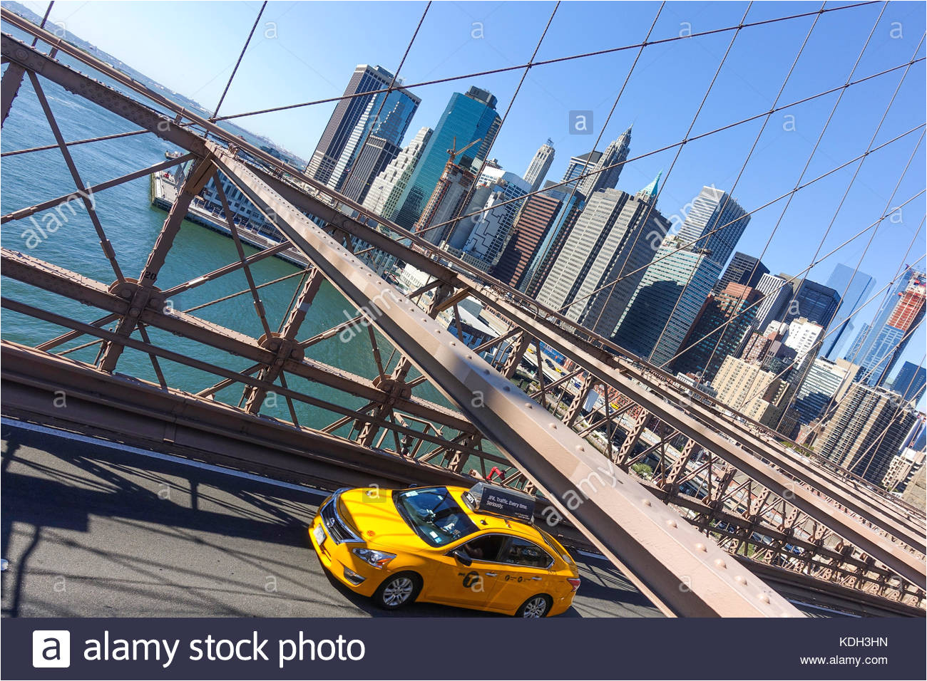 brooklyn bridge roadway with yellow cab new york manhattan united states usa