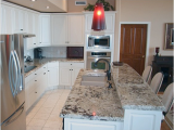 Alaska White Granite with Antique White Cabinets Alaska White Granite