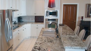 Alaska White Granite with Antique White Cabinets Alaska White Granite