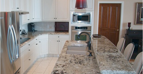 Alaska White Granite with Antique White Cabinets Alaska White Granite