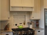 Alaska White Granite with Antique White Cabinets Almost Finished Light and Dark Kitchen with White Alaska