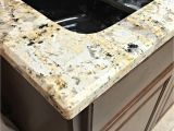 Alaska White Granite with Brown Cabinets Our Beautiful River White Granite Countertops Maybe Granite