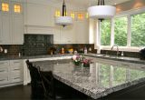 Alaska White Granite with Gray Cabinets Lennon Granite Completed with Gray Subway Tiles and Cupboard Back