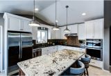 Alaska White Granite with Off White Cabinets Painted Cabinets with Alaska White Granite On the island