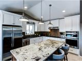 Alaska White Granite with Off White Cabinets Painted Cabinets with Alaska White Granite On the island