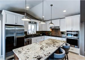 Alaska White Granite with Off White Cabinets Painted Cabinets with Alaska White Granite On the island