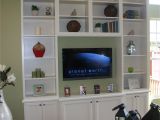 Built In Entertainment Center Plans with Drywall Diy Tall Entertainment Center with Stock Cabinets and Bookshelves
