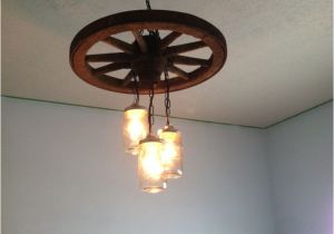 Diy Wagon Wheel Ceiling Fan 1000 Ideas About Wagon Wheel Light On Pinterest Wagon