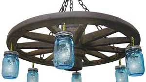 Diy Wagon Wheel Ceiling Fan 25 Best Wagon Wheel Chandelier Ideas On Pinterest Wagon