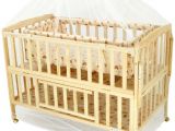 Half Baby Crib attached to Bed Happy Dino Beige Bassinet Buy Happy Dino Beige Bassinet Online at