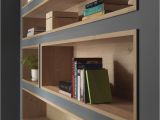 How to Decorate A Half Wall Ledge Built In Bookshelves Lined with Wood Highlight the Displayed Decor
