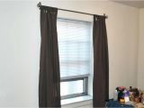 How to Hang Curtains Over Vertical Blinds without Drilling How to Hang Curtains Over Vertical Blinds without Drilling