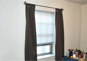 How to Hang Curtains Over Vertical Blinds without Drilling How to Hang Curtains Over Vertical Blinds without Drilling