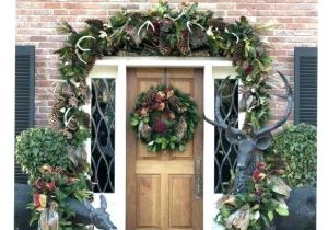 How to Hang Garland Around Front Door with Vinyl Siding Hanging Garland Around Front Door Front Doors Lighted