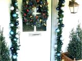 How to Hang Garland Around Front Door with Vinyl Siding How to Hang Garland Around Door How to Hang Garland On